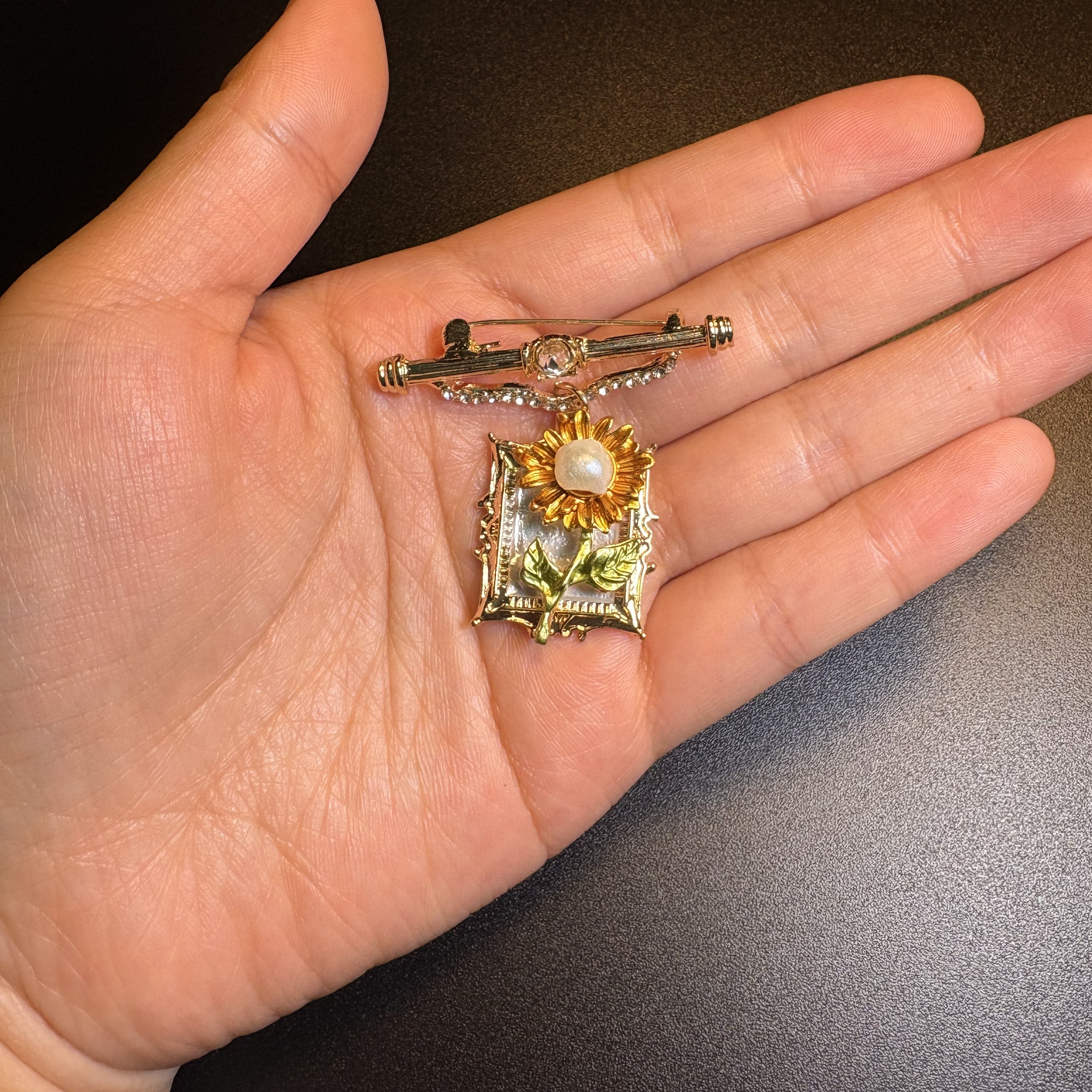 Gilded Sunframe Brooch